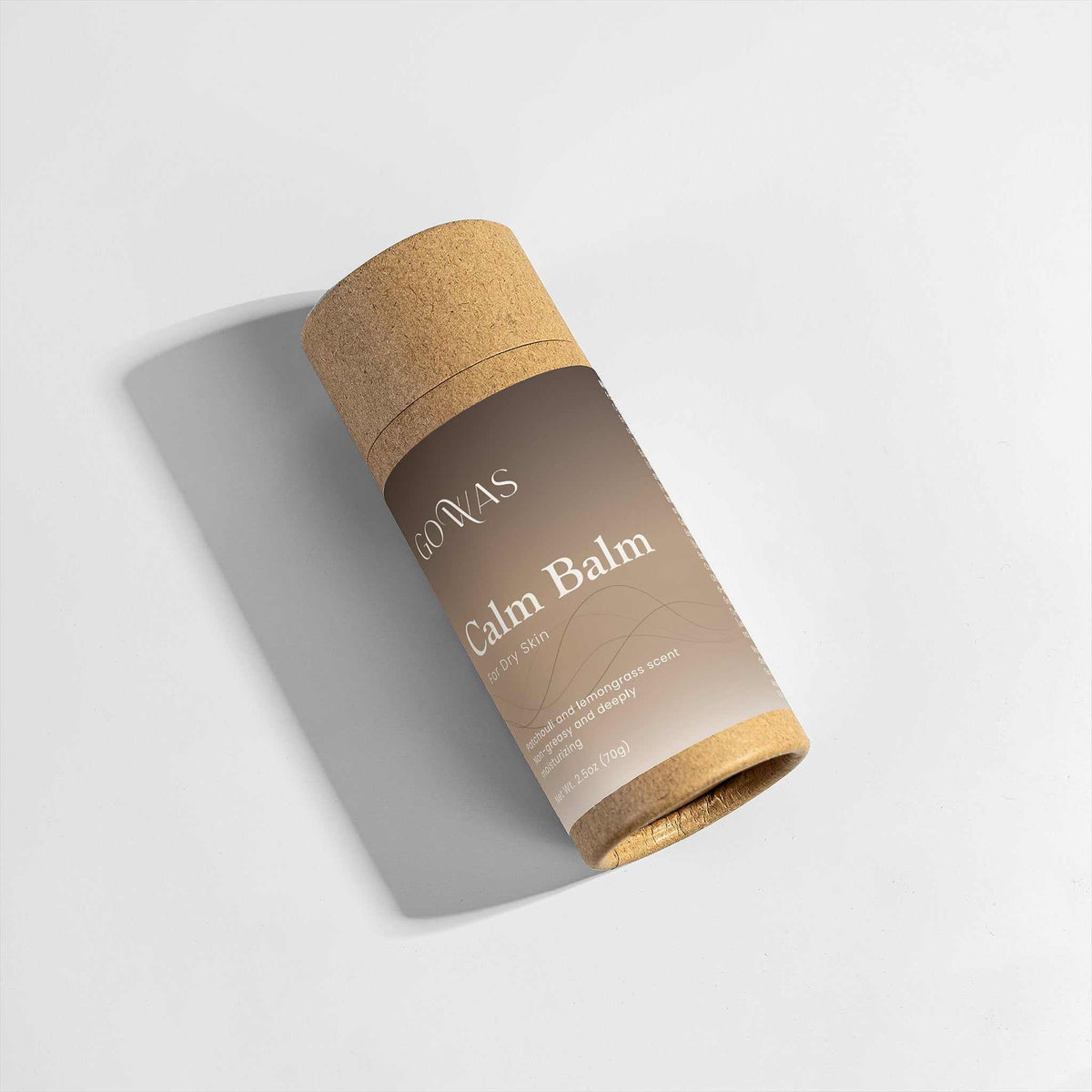 Calm Balm in a brown paper tube with a natural cork-style cap and minimalist cream lettering