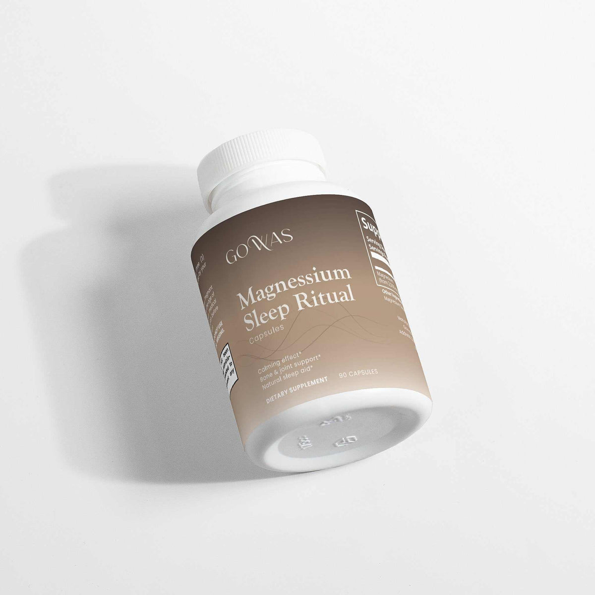 Magnesium Sleep Ritual supplement in a white bottle with a beige label and brown upper band, featuring a white cap.