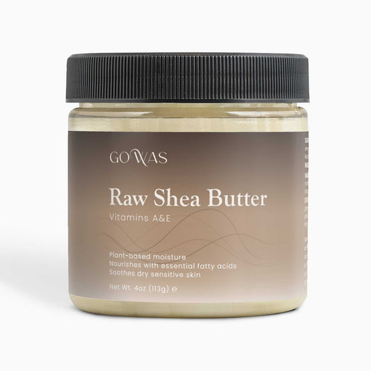 Raw Shea Butter in a beige-labeled jar with a black ribbed lid, labeled with vitamins A and E