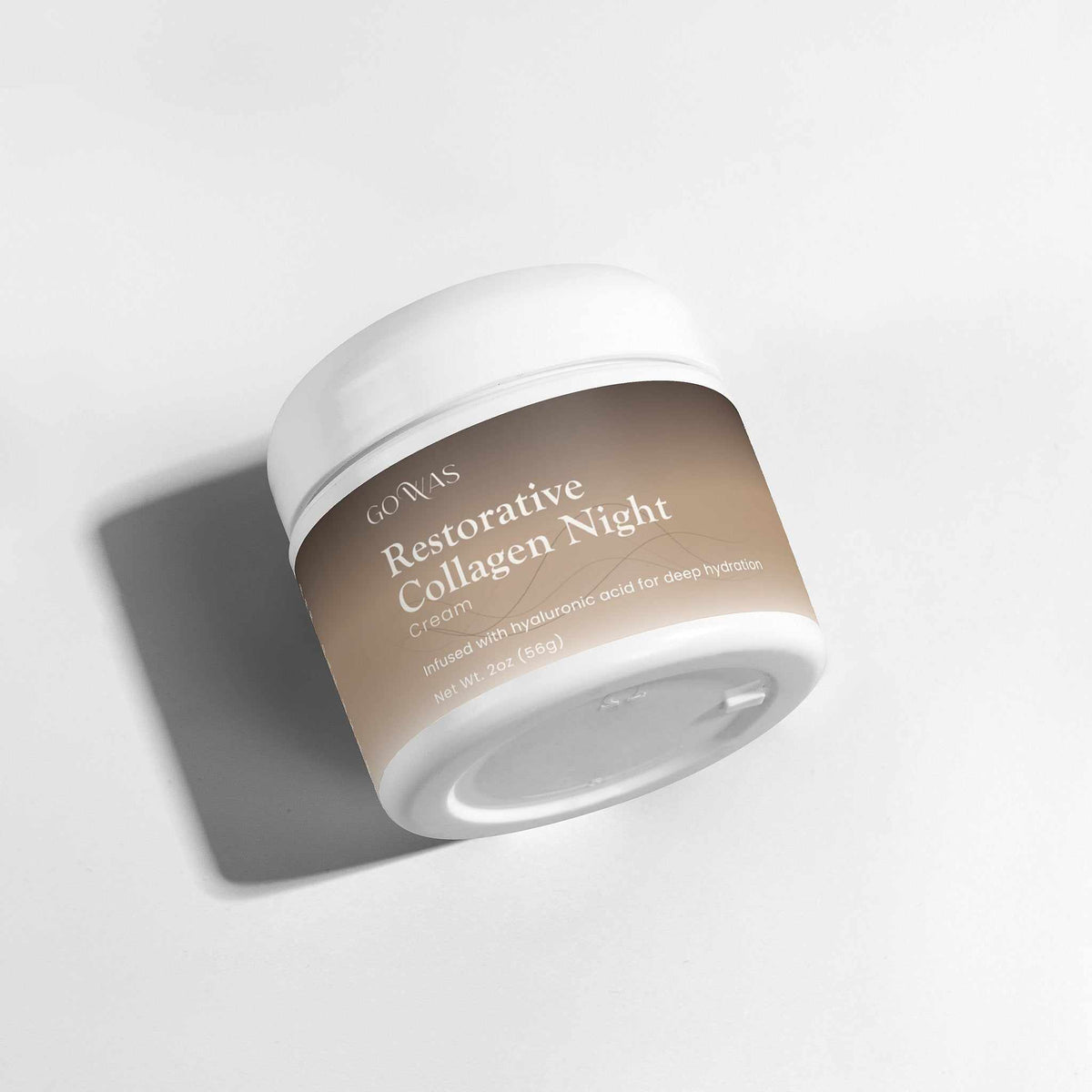 Restorative Collagen Night cream in a beige jar with a white lid and white lettering on the label.